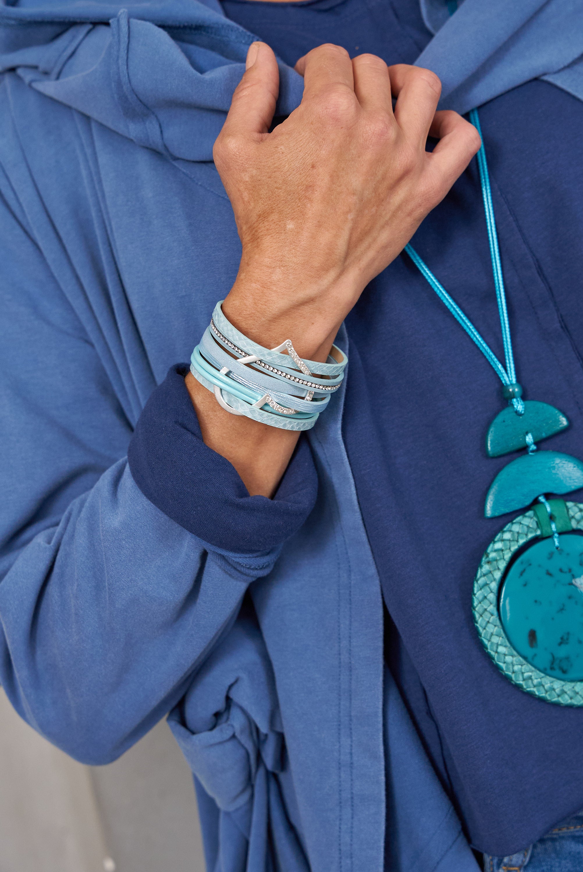 Light blue large leather and heart strap bracelet