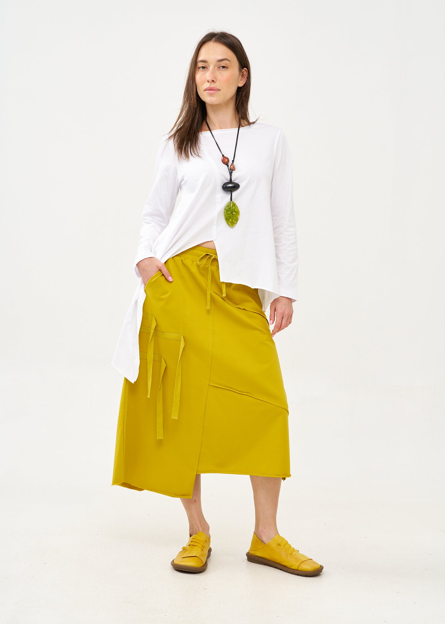 Asymmetrical skirt with reverse combination and mustard ribbons