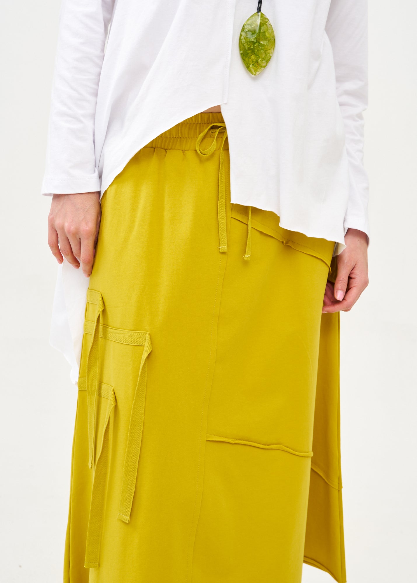 Asymmetrical skirt with reverse combination and mustard ribbons