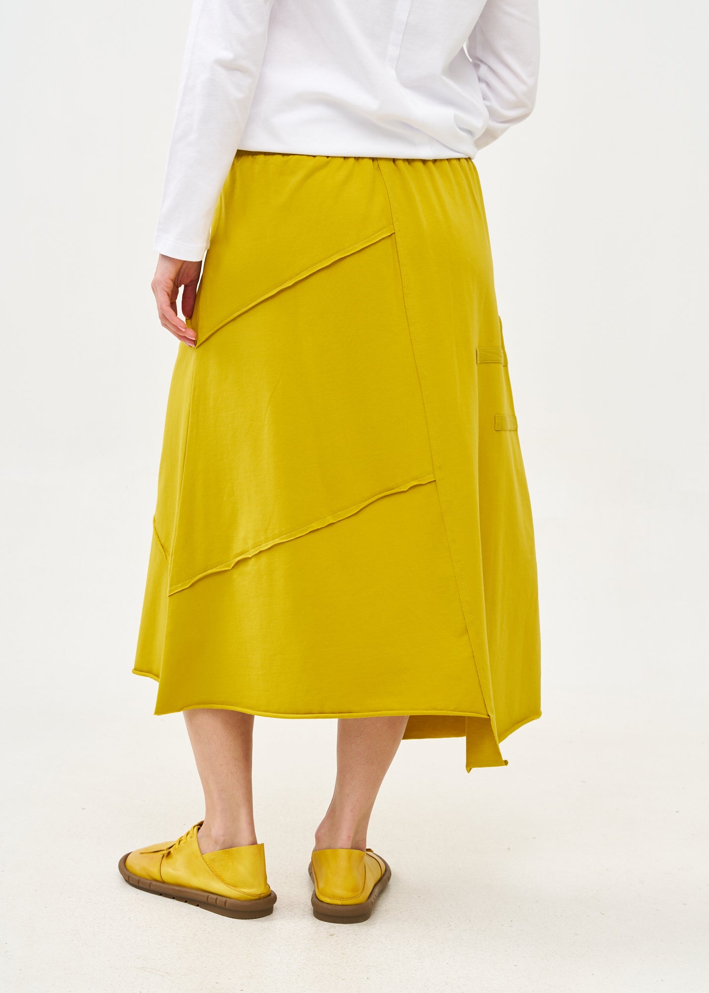 Asymmetrical skirt with reverse combination and mustard ribbons