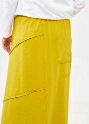 Asymmetrical skirt with reverse combination and mustard ribbons