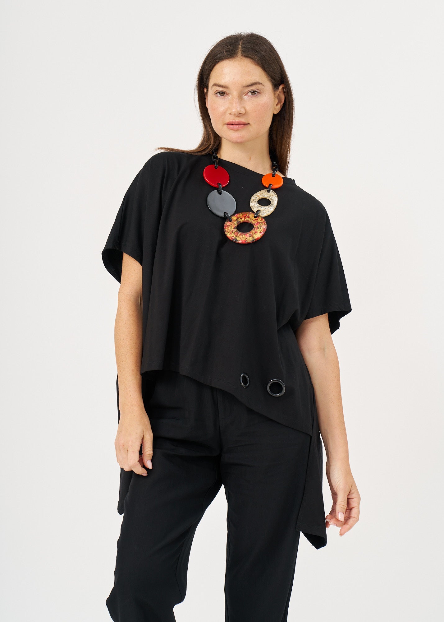 A shirt with no.s that expands on the sides with a black loop