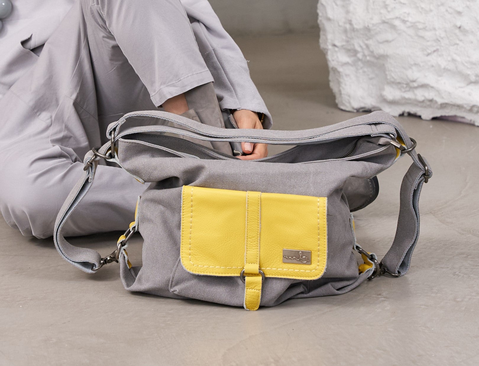 Dark gray canvas and leather backpack