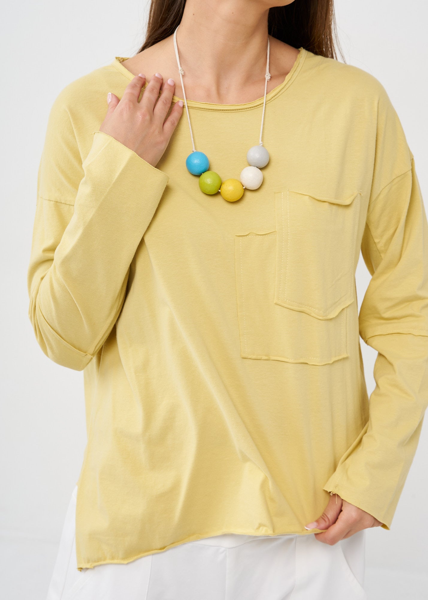 Yellow long sleeve diagonal extension shirt