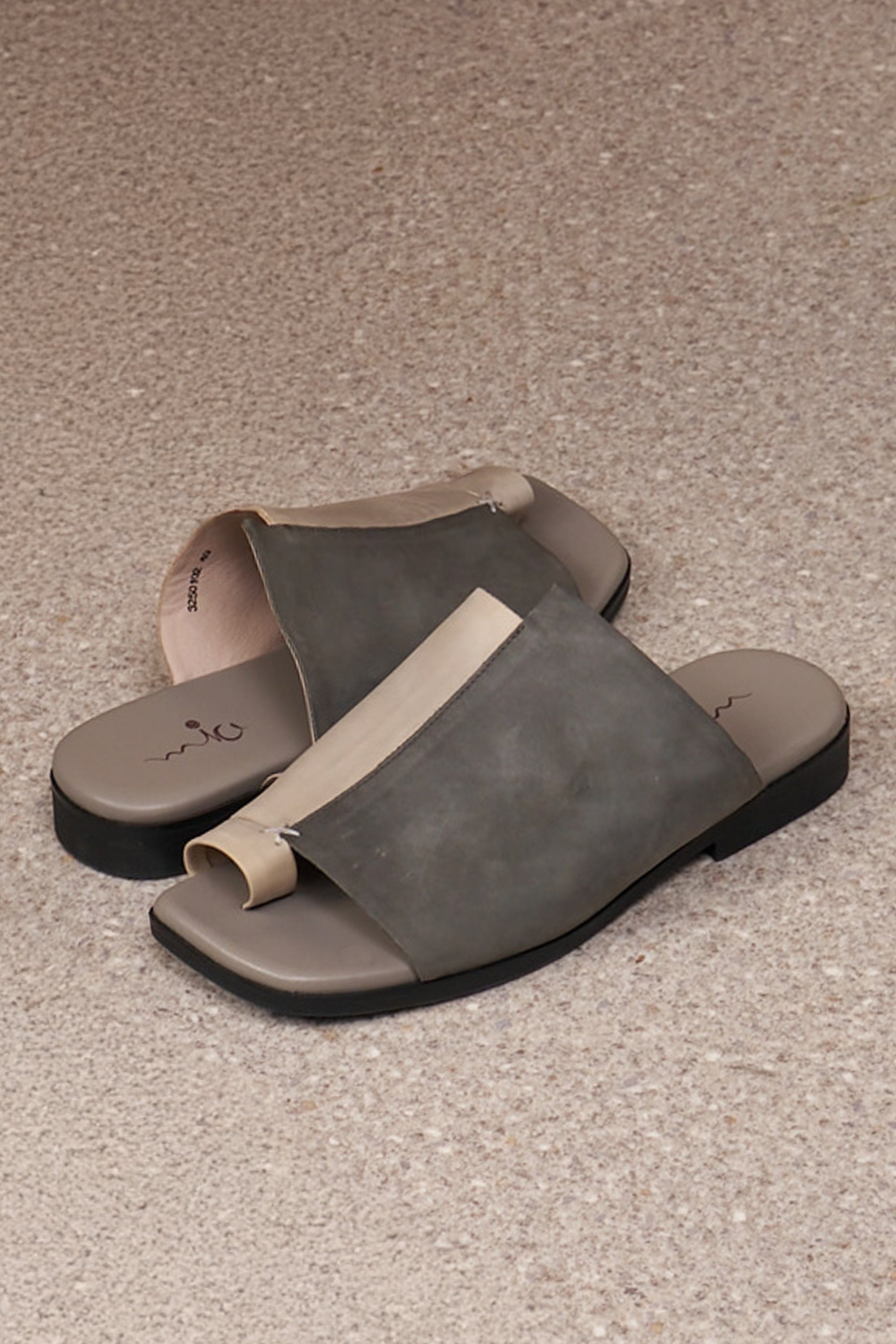 Comfort slippers in a combination of gray and washed leathers