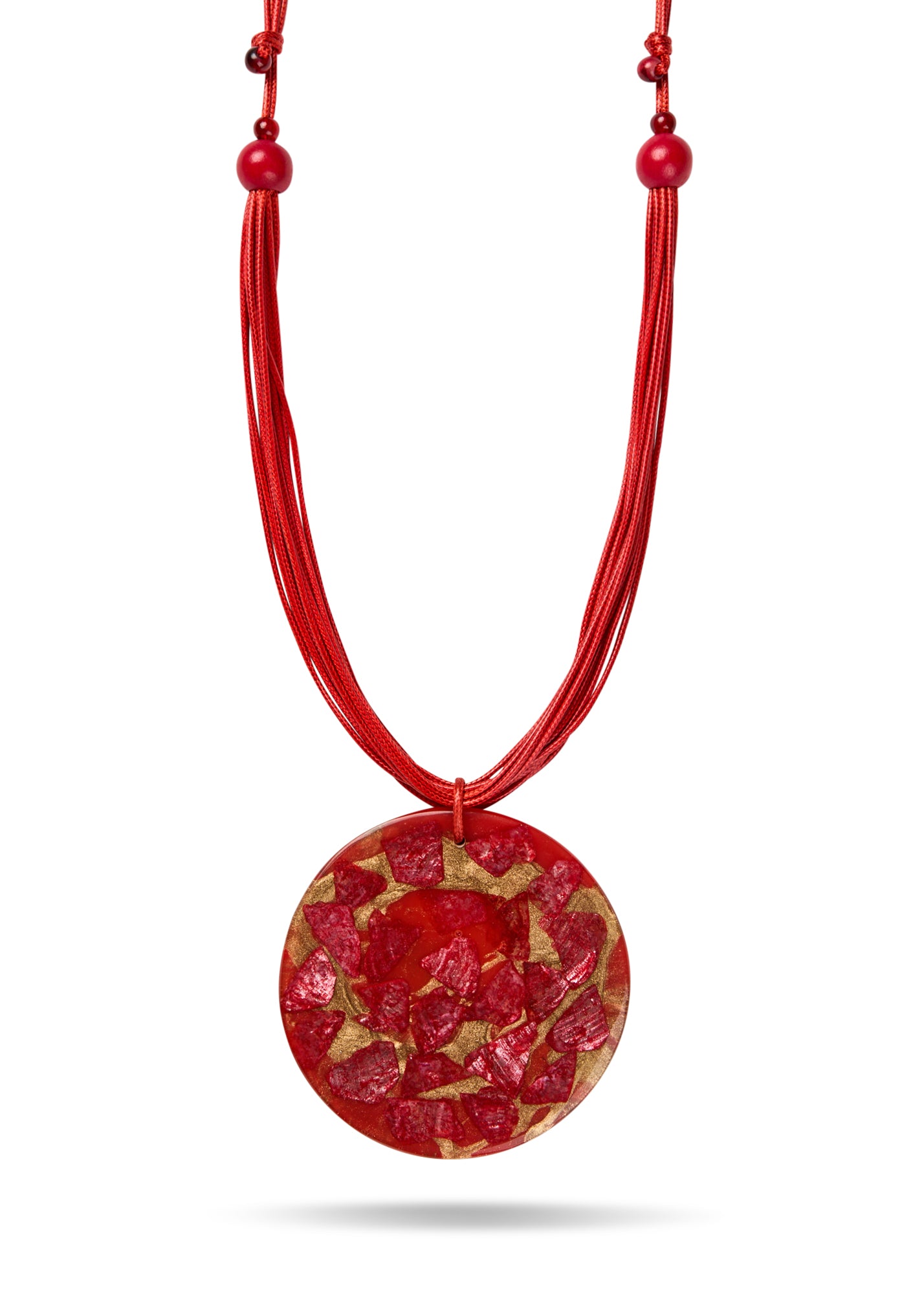 Handmade necklace made of threads and a large red resin circle