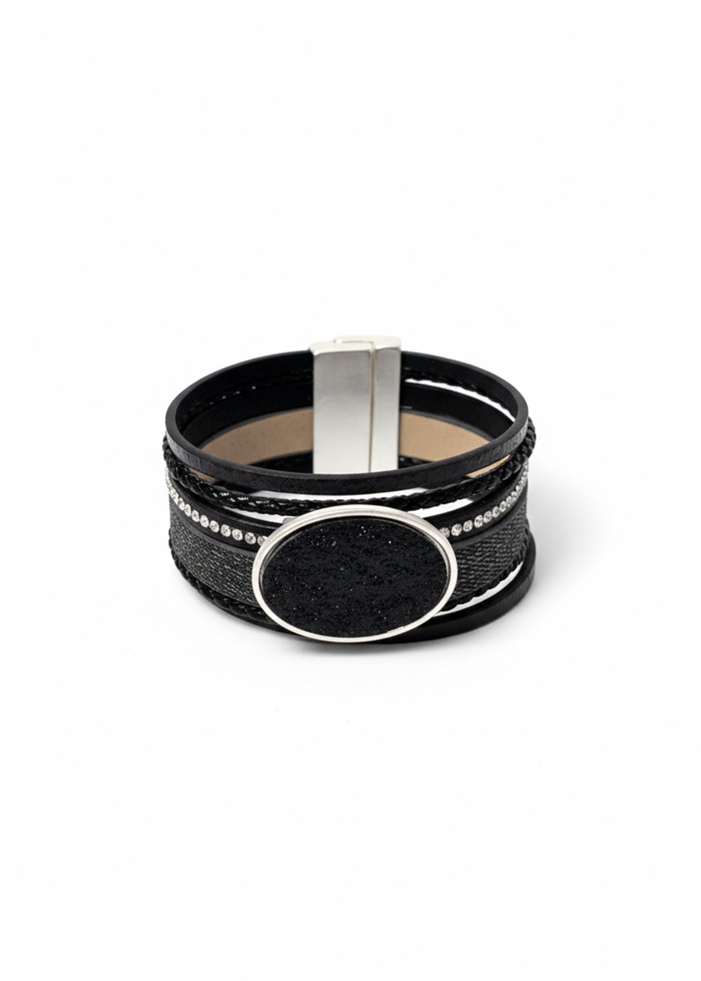 Bracelet with rows of different types of leather and a black stone-like element