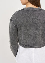 Black three-button washed knit top