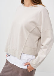 סווטשירט סיומת אסימטרית אפור בהיר