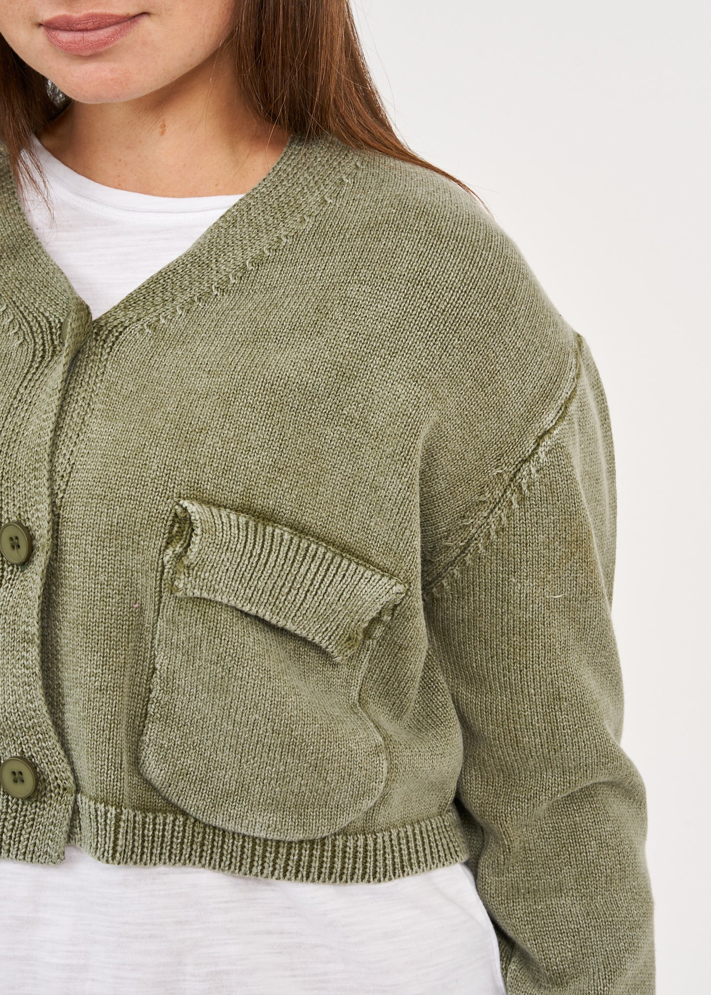 Dark green three-button washed knit top