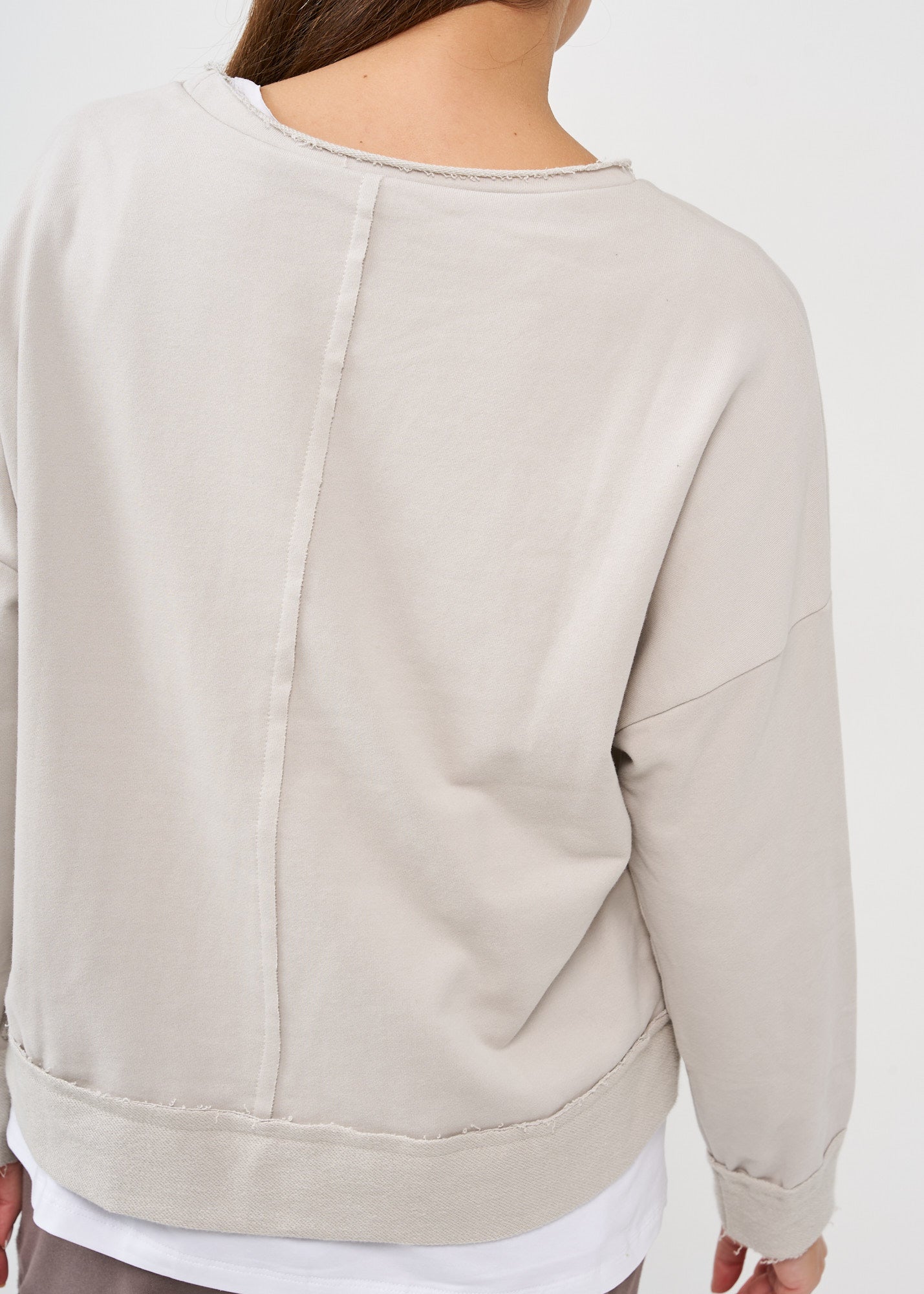 סווטשירט סיומת אסימטרית אפור בהיר