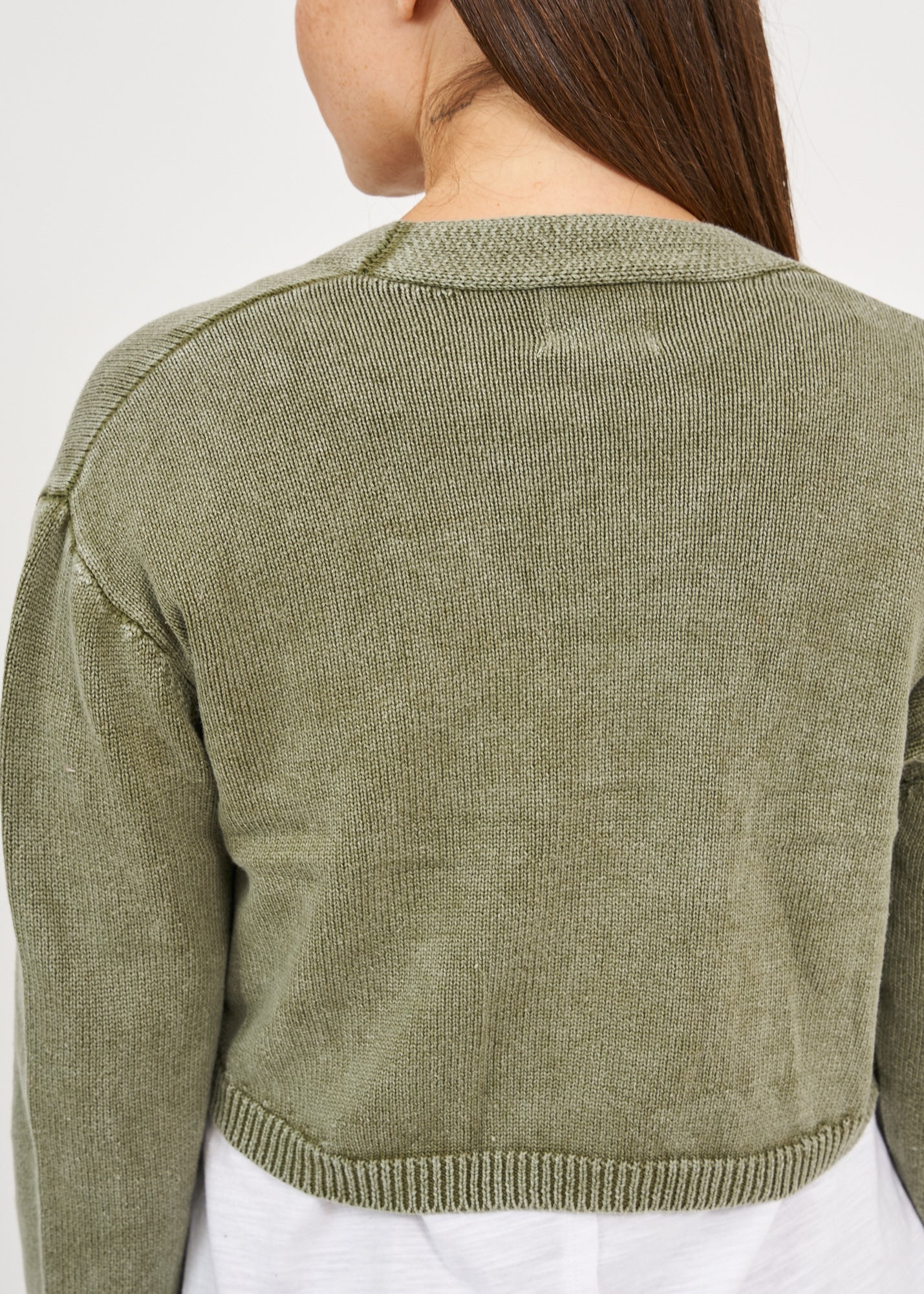 Dark green three-button washed knit top