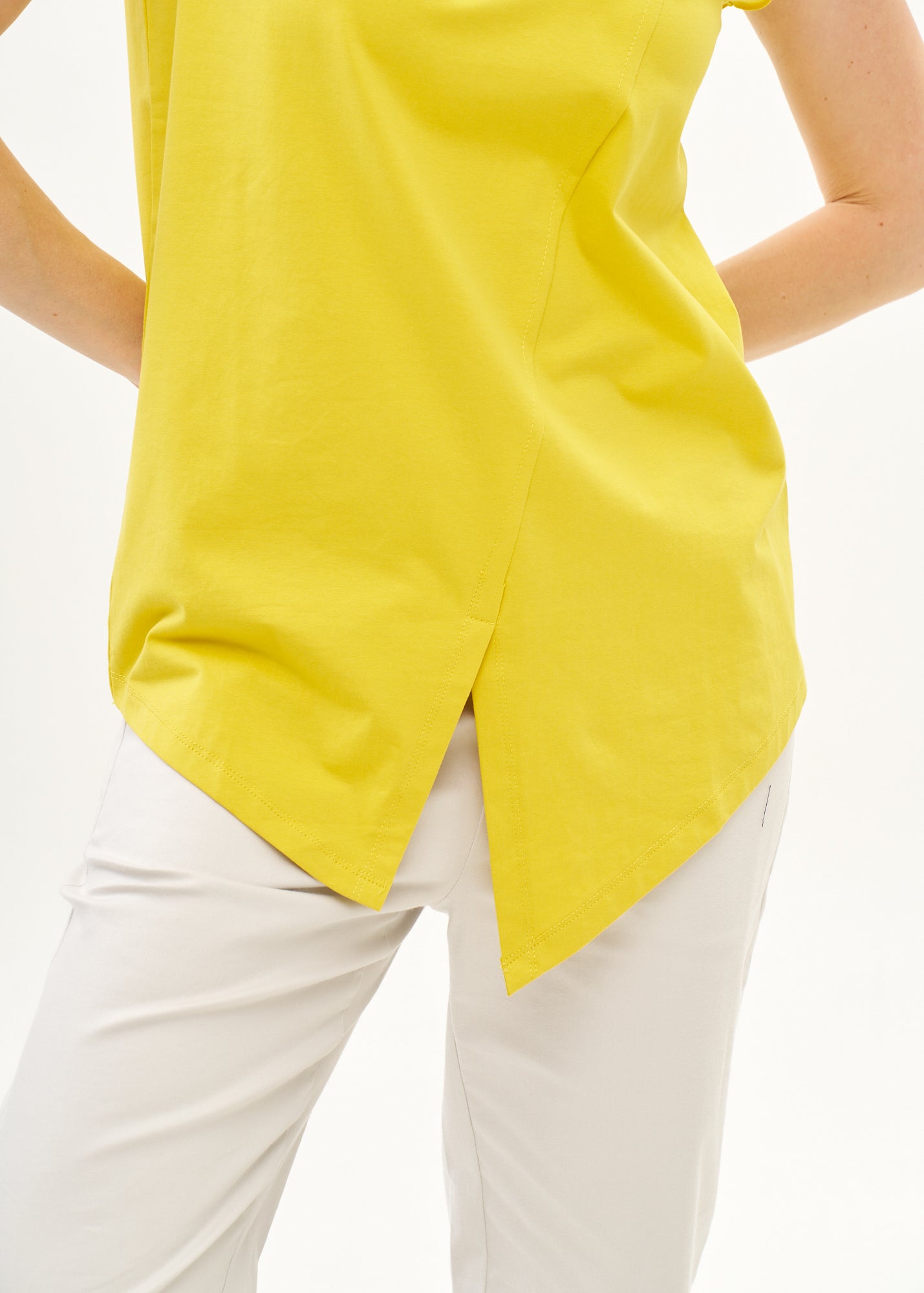 Yellow top with diagonal stitching