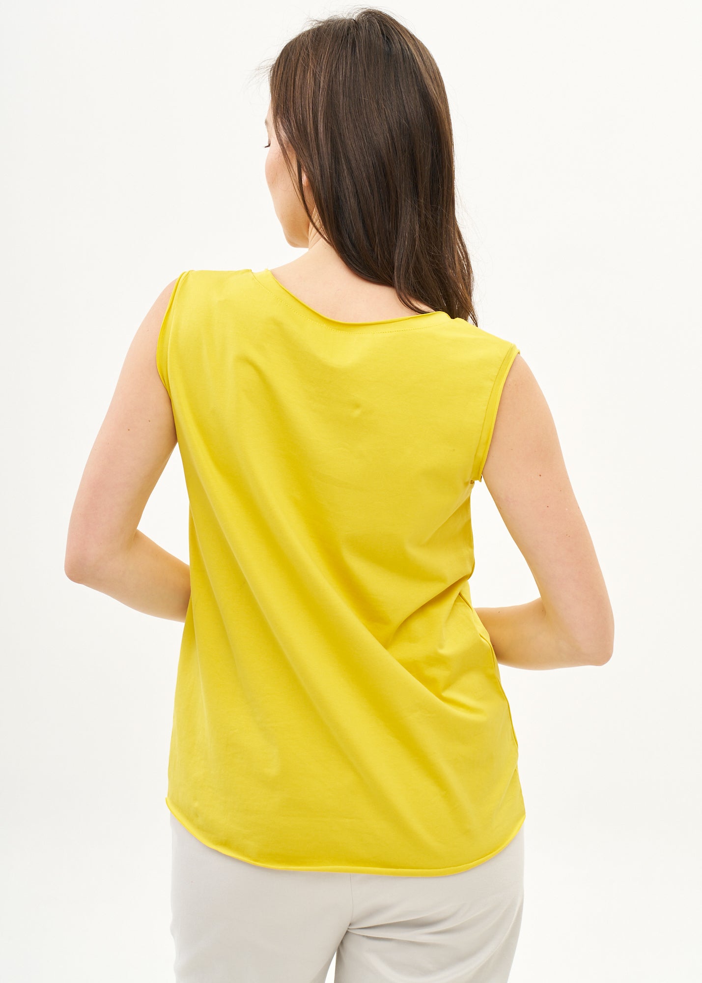 Yellow top with diagonal stitching