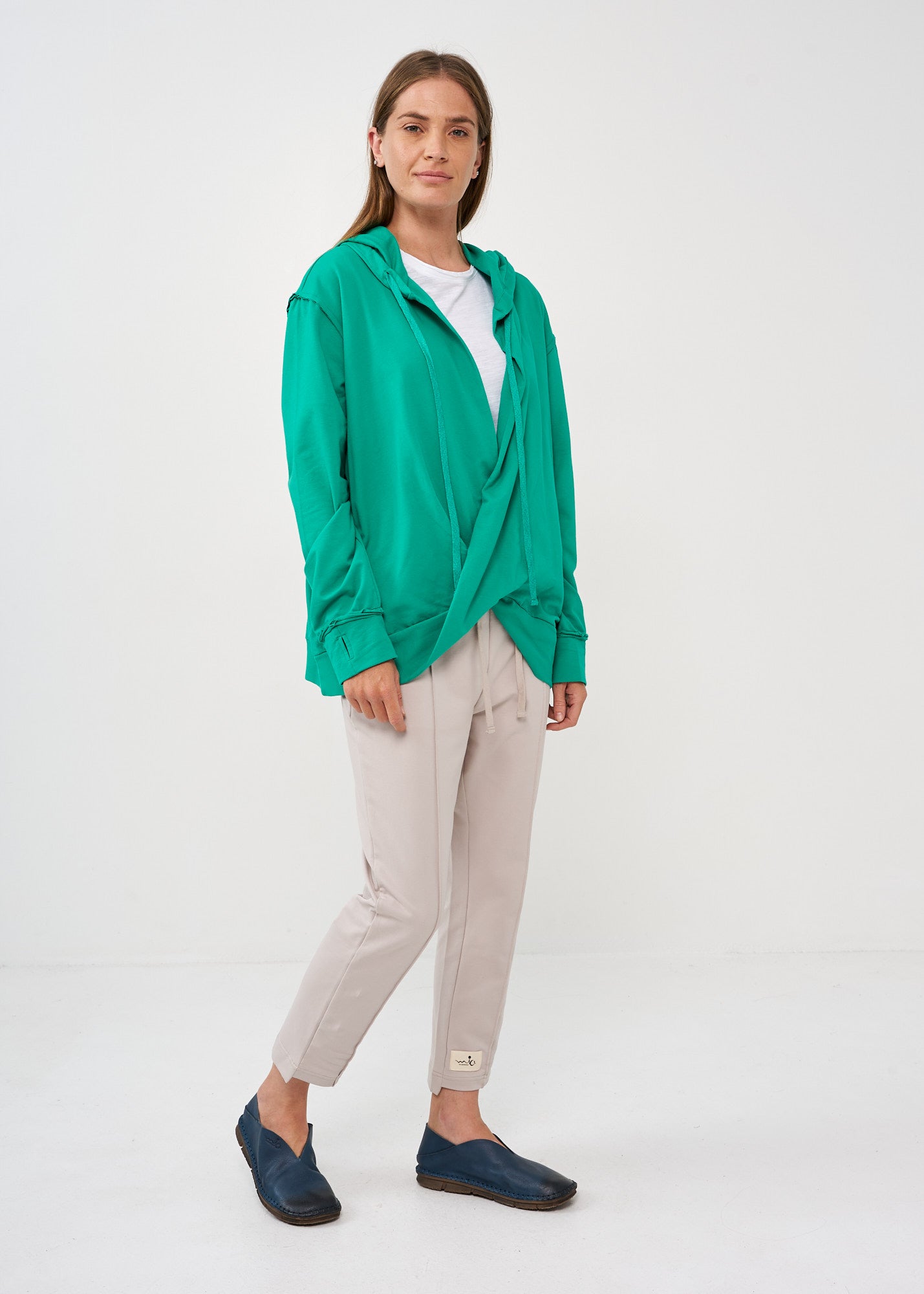 Twisted-end sweatshirt and turquoise hoodie