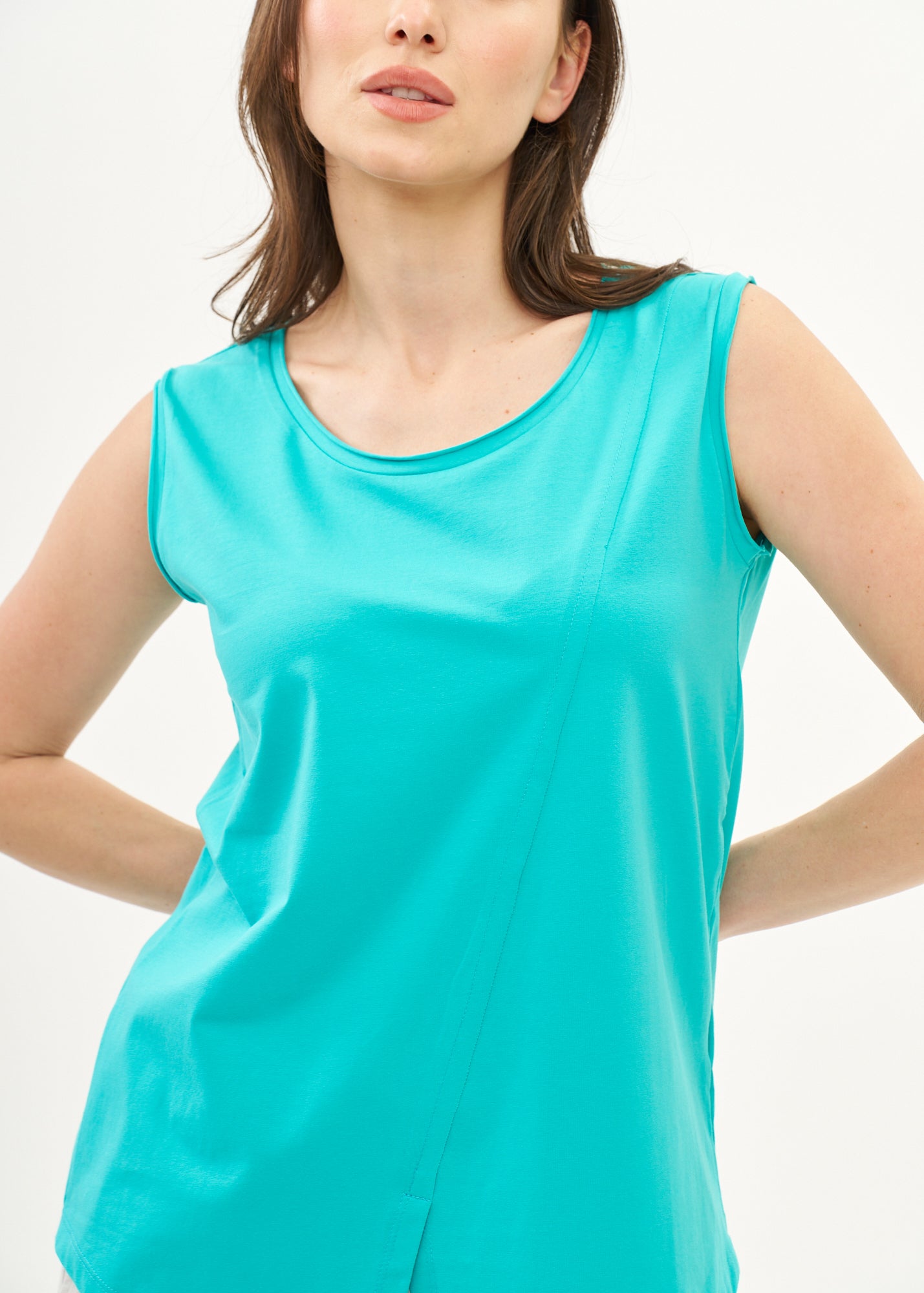 Turquoise top with diagonal stitching