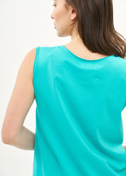 Turquoise top with diagonal stitching