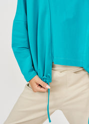 חולצה גולף אמצע שילוב הפוך טורקיז