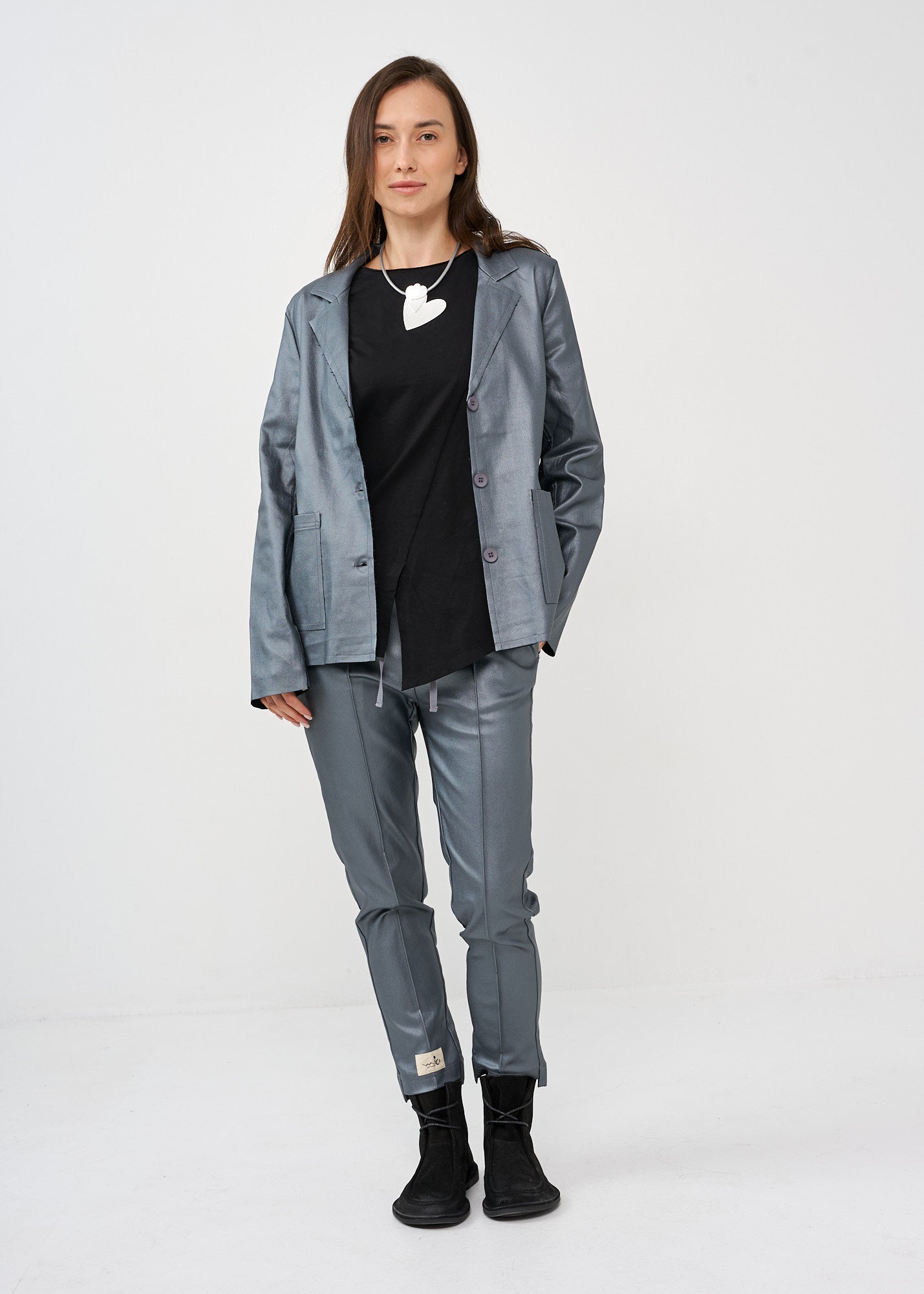 Dark gray leather-like mid-seam pants