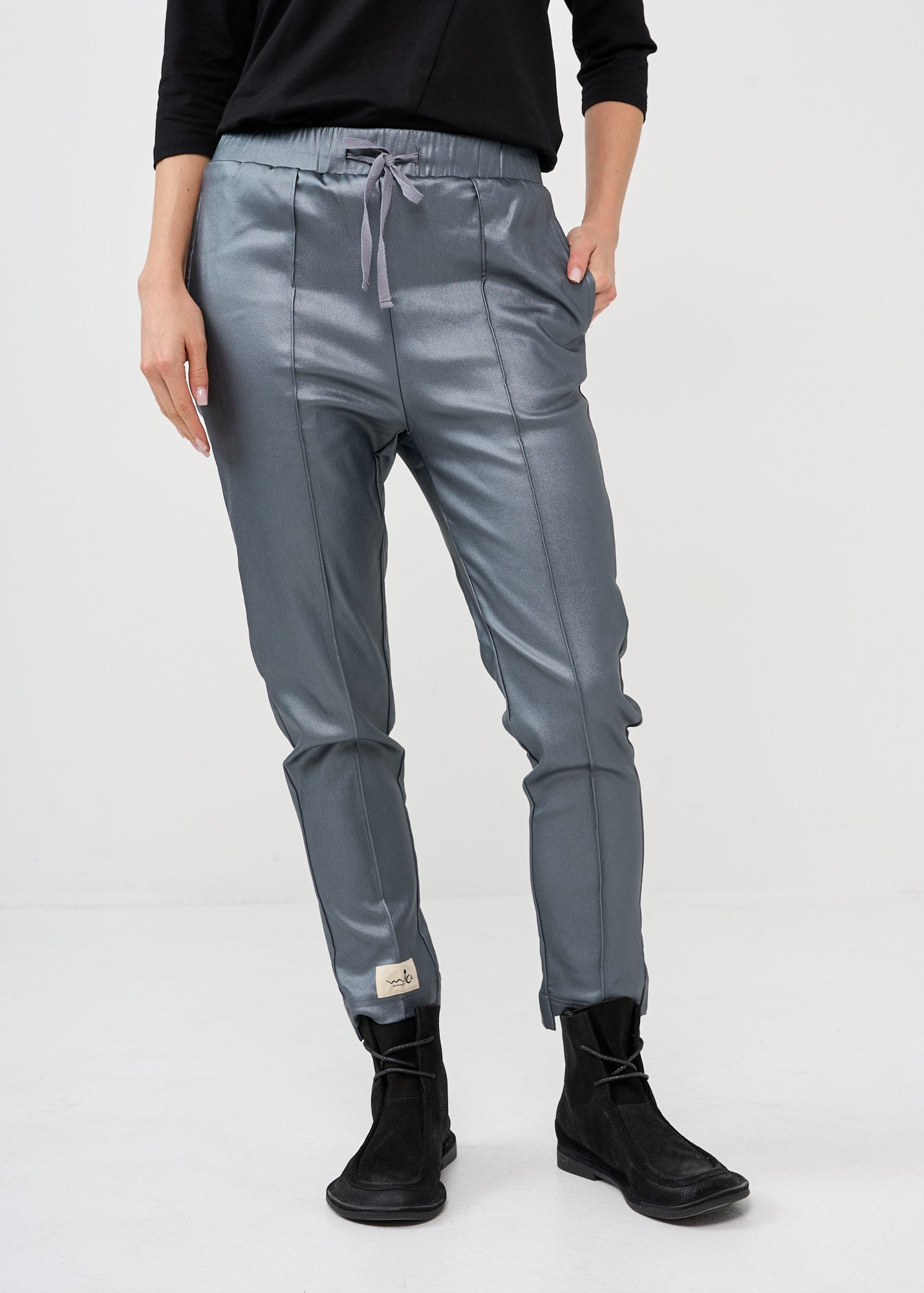 Dark gray leather-like mid-seam pants