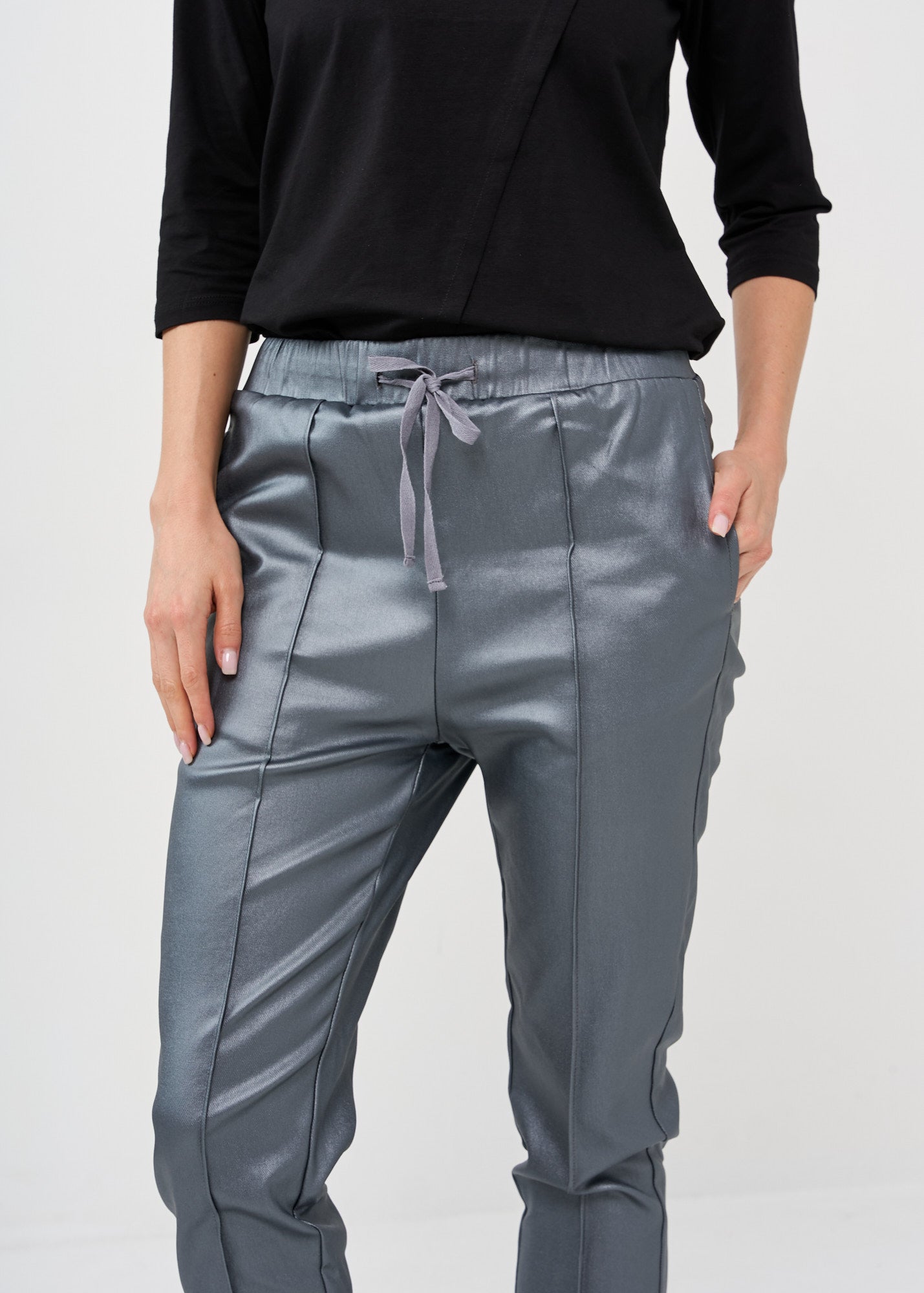 Dark gray leather-like mid-seam pants