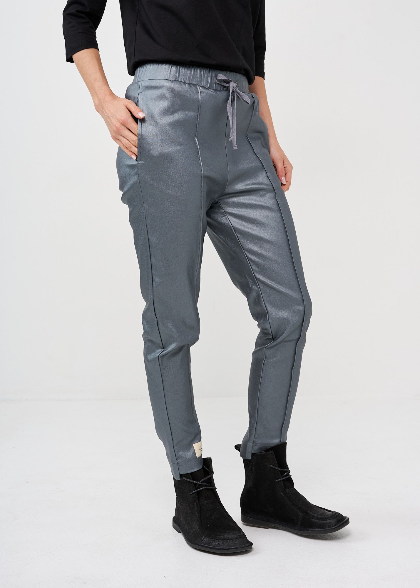 Dark gray leather-like mid-seam pants