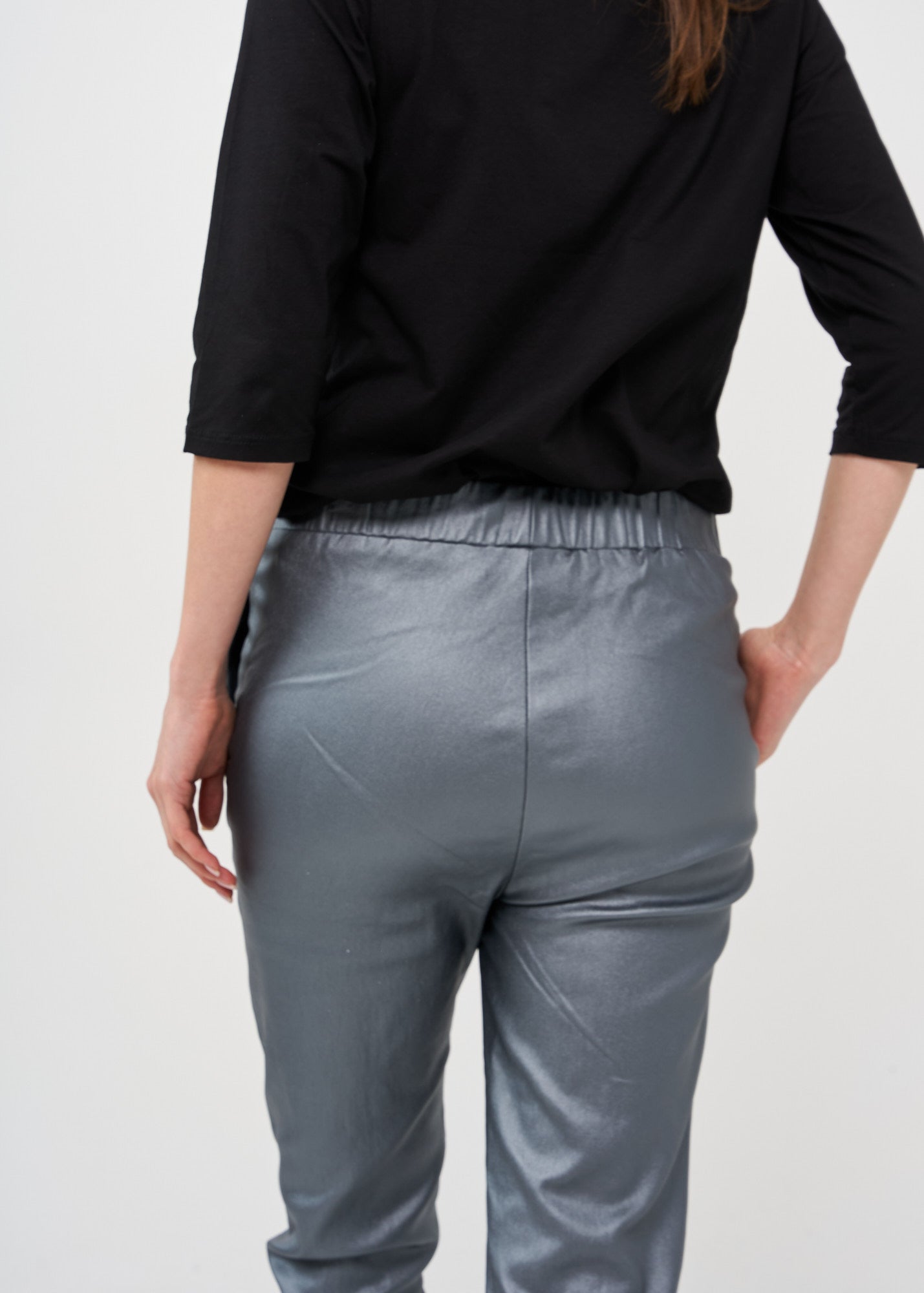 Dark gray leather-like mid-seam pants