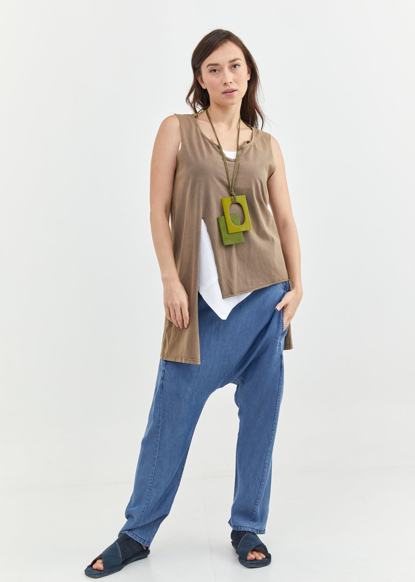 A small v-neck top with a brown front cut