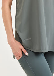 Green tank top open on the sides