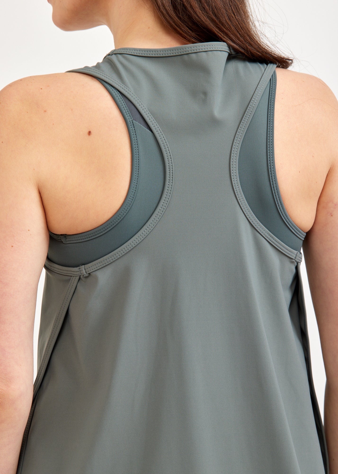 Green tank top open on the sides