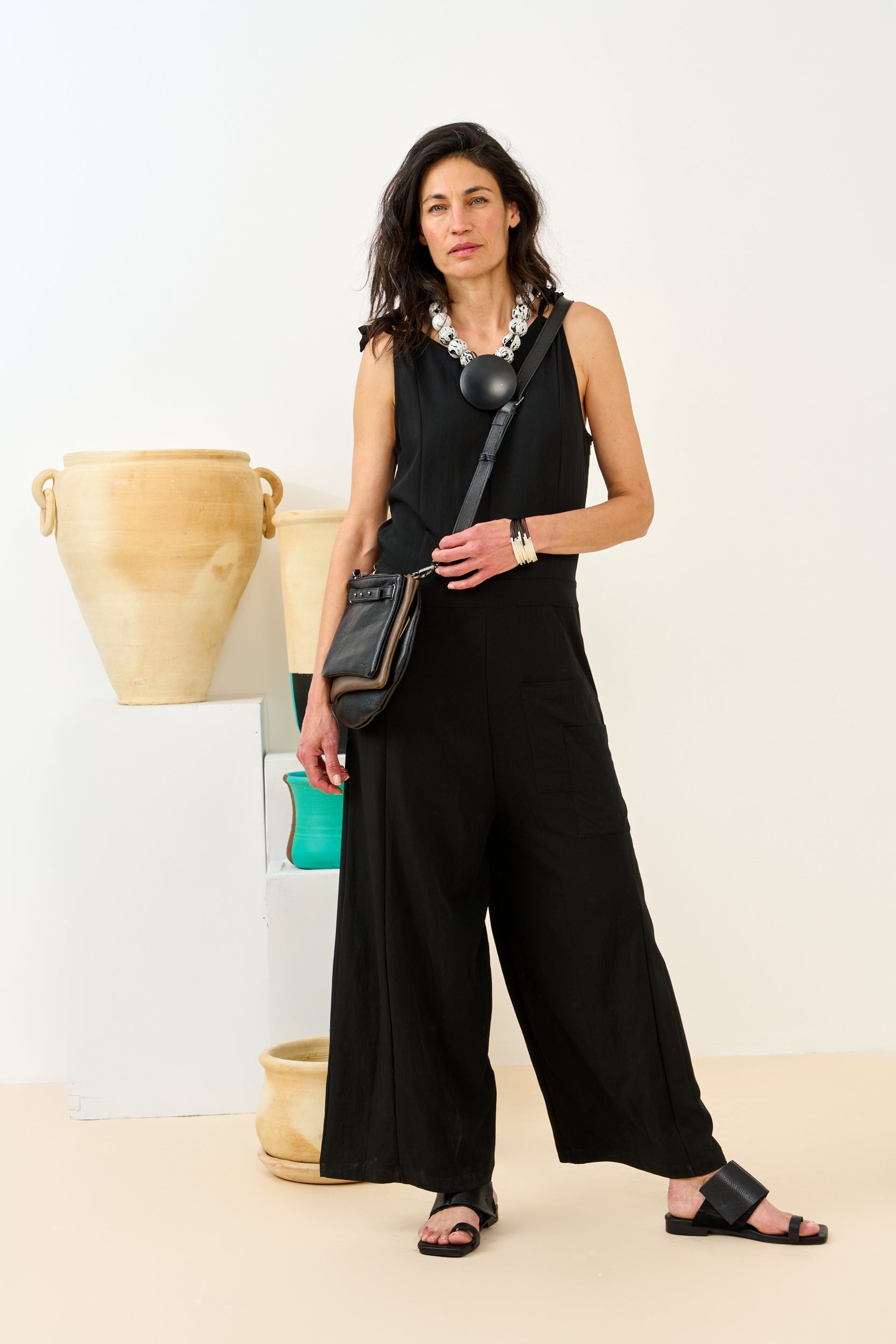 Black three-pocket leather evening bag