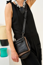 Black three-pocket leather evening bag