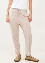 Pants with a seam in the middle and a stone patch