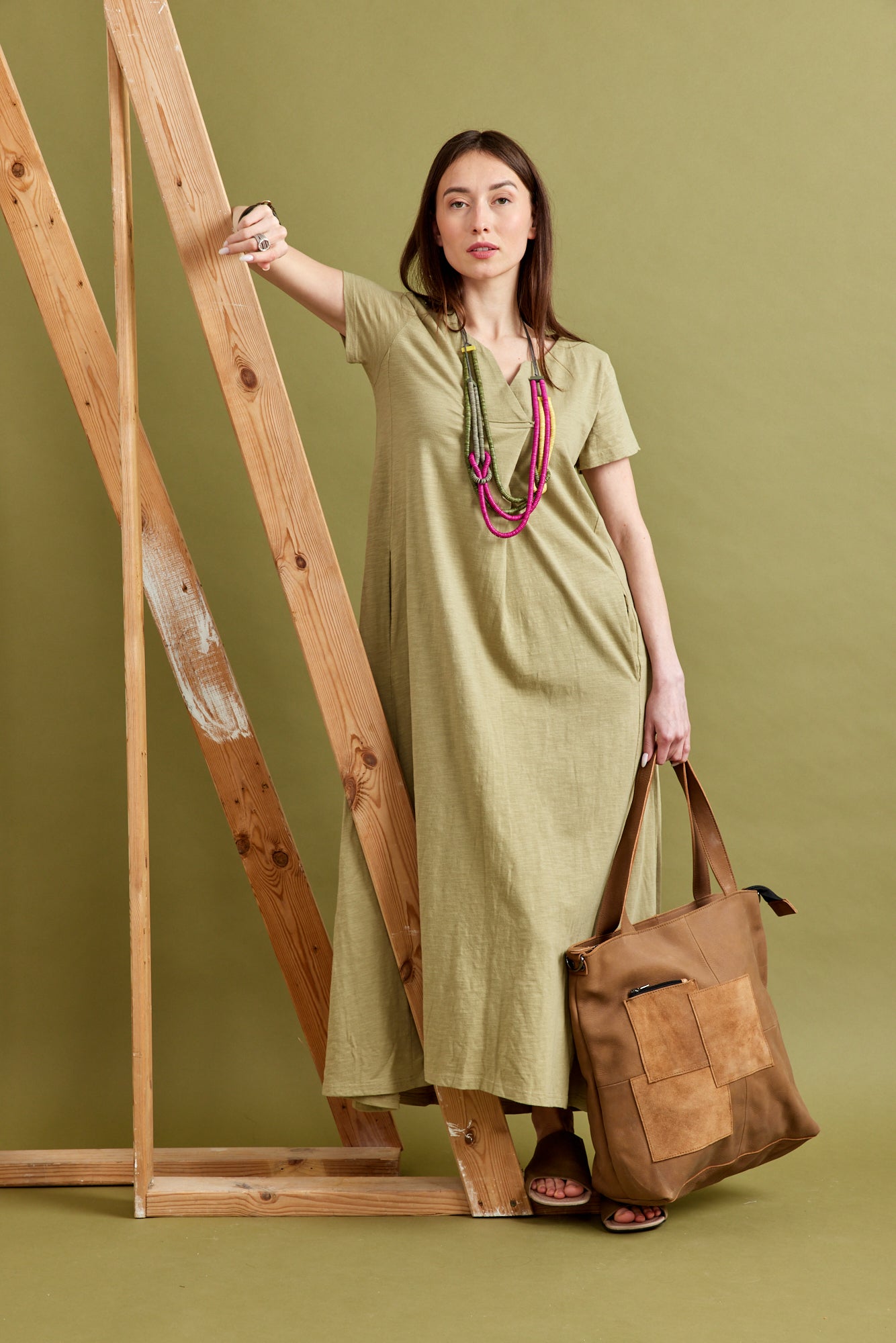 Large side canvas bag with black front leather square