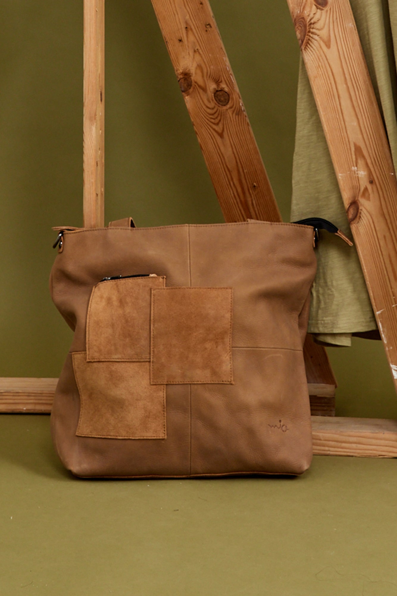 Large side canvas bag with black front leather square
