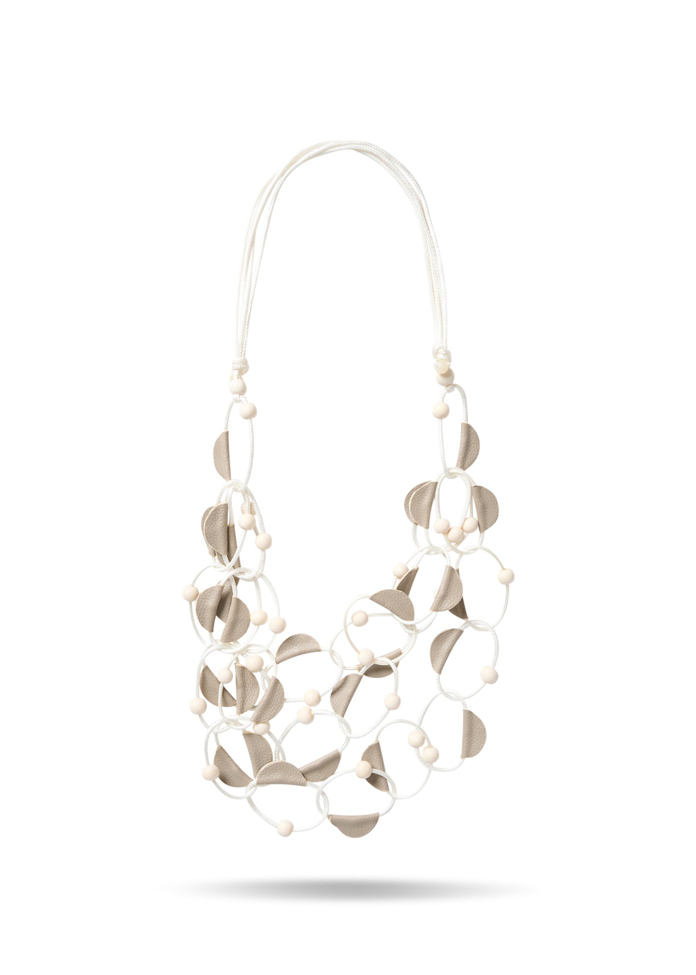 Loop chain with white sewing leather halves on it