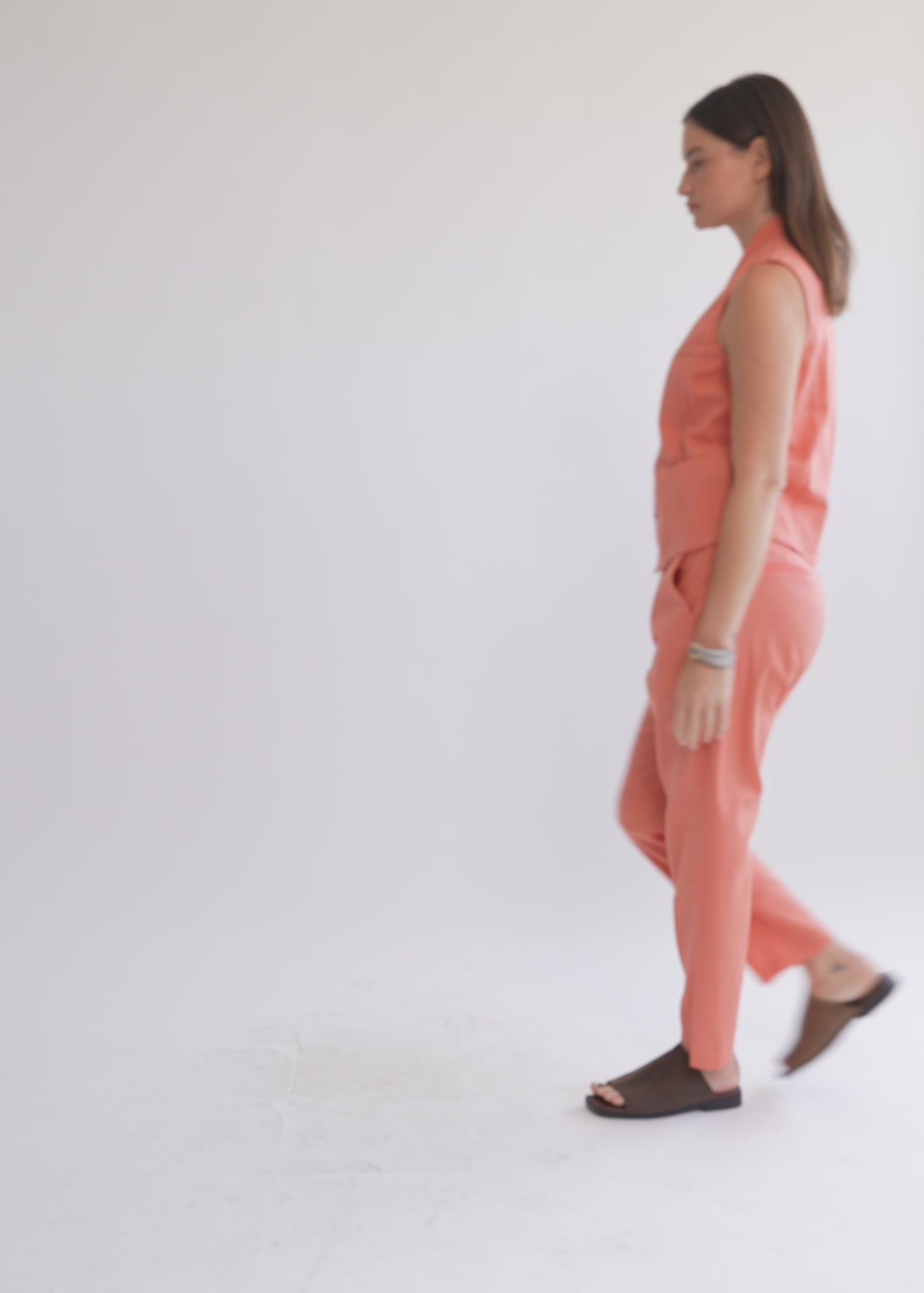 וסט שילוב סרט סולמות וכפתורים כתום